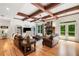 Cozy living room with coffered ceilings, fireplace, and hardwood floors at 1825 Epperson Rd, Canton, GA 30115