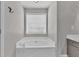 Bathroom with a large soaking tub at 2180 Oakpointe Ct, Buford, GA 30519