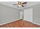 Bedroom with wood floors and a ceiling fan at 2180 Oakpointe Ct, Buford, GA 30519