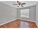 Bedroom with wood floors and a ceiling fan at 2180 Oakpointe Ct, Buford, GA 30519