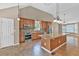 Spacious kitchen with stainless appliances, center island, granite countertops and a vaulted ceiling at 2180 Oakpointe Ct, Buford, GA 30519