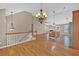 Spacious living spaces with the kitchen, dining, and living room all in view, great for entertaining at 2180 Oakpointe Ct, Buford, GA 30519