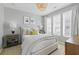 Cozy bedroom featuring a comfortable bed, soft lighting, and a relaxing atmosphere at 407 Pratt Se Dr # 1101, Atlanta, GA 30315