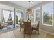Bright dining area with access to a balcony, lots of seating, and ample natural light at 407 Pratt Se Dr # 1101, Atlanta, GA 30315