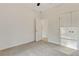 Neutral bedroom featuring gray carpeting and a closet with double doors at 70 Wheeler Lake Path, Dallas, GA 30157