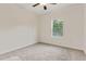 Bright bedroom with large window providing a view of lush greenery at 70 Wheeler Lake Path, Dallas, GA 30157