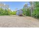 New two-story home with spacious backyard and deck, set in a private, wooded area, offering a serene living environment at 70 Wheeler Lake Path, Dallas, GA 30157
