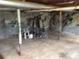 Unfinished basement with support poles at 135 Golden Hills Dr, Woodstock, GA 30189