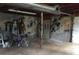 Unfinished basement with garage door at 135 Golden Hills Dr, Woodstock, GA 30189