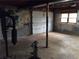 Unfinished basement with concrete floor, cinder block walls and natural light at 135 Golden Hills Dr, Woodstock, GA 30189