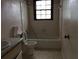 Classic bathroom with a single vanity and a shower-tub combination at 135 Golden Hills Dr, Woodstock, GA 30189