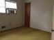 Cozy bedroom with neutral walls and a window for natural light at 135 Golden Hills Dr, Woodstock, GA 30189