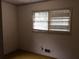 Bedroom with a window providing natural light at 135 Golden Hills Dr, Woodstock, GA 30189