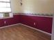 Bedroom with hardwood floors and colorful decorative accents at 135 Golden Hills Dr, Woodstock, GA 30189