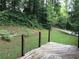 Wooden deck with railing overlooking the backyard at 135 Golden Hills Dr, Woodstock, GA 30189