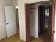 Hallway with closets and open door at 135 Golden Hills Dr, Woodstock, GA 30189