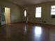 Inviting living room with hardwood floors and plenty of natural light at 135 Golden Hills Dr, Woodstock, GA 30189