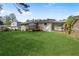 Spacious backyard with new deck, carport and freshly painted brick at 2148 Green Forrest Dr, Decatur, GA 30032