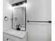 Bathroom features a modern vanity with a stylish mirror and updated fixtures at 2148 Green Forrest Dr, Decatur, GA 30032