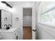 Bathroom features a modern vanity with a stylish mirror and updated fixtures at 2148 Green Forrest Dr, Decatur, GA 30032