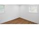 An empty bedroom featuring wood flooring and window letting in plenty of natural light at 2148 Green Forrest Dr, Decatur, GA 30032