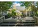Inviting backyard deck with comfortable seating and umbrella, ideal for relaxation and outdoor dining at 2191 Flowering Dr, Grayson, GA 30017