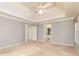 Large bedroom showing en-suite bathroom and closet at 386 Collegiate Dr, Powder Springs, GA 30127