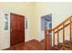 Spacious foyer with hardwood floors, a staircase, and abundant natural light at 386 Collegiate Dr, Powder Springs, GA 30127