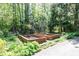 Landscaped garden area featuring raised beds at 386 Collegiate Dr, Powder Springs, GA 30127