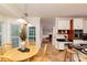 Open-concept kitchen and breakfast nook with stainless steel appliances at 386 Collegiate Dr, Powder Springs, GA 30127