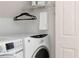 Convenient laundry area featuring a modern washer and dryer set at 386 Collegiate Dr, Powder Springs, GA 30127