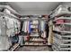 Spacious walk-in closet with custom shelving and plenty of storage for shoes and clothing at 3925 Sierra Knolls Ct, Cumming, GA 30040