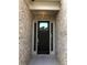 Elegant front door featuring sidelights and transom window, set in a brick facade at 3925 Sierra Knolls Ct, Cumming, GA 30040
