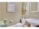 Charming half bathroom with stylish fixtures and elegant decor at 105 New Castle Ln, Tyrone, GA 30290