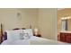 Bedroom with a view of the bathroom; features neutral walls, carpet and a bathroom view at 105 New Castle Ln, Tyrone, GA 30290