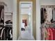 Walk-in closet featuring custom shelving and ample storage space at 105 New Castle Ln, Tyrone, GA 30290