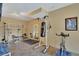 Home gym featuring exercise equipment, tile flooring, neutral walls and overhead lighting at 105 New Castle Ln, Tyrone, GA 30290
