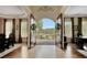 Elegant foyer featuring arched doorways and stunning views of the landscaped front yard at 105 New Castle Ln, Tyrone, GA 30290