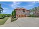 Spacious brick home featuring a large three car garage and well-maintained landscaping at 105 New Castle Ln, Tyrone, GA 30290