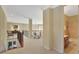 Open hallway with decorative railing, showcasing the home's spacious design and natural light at 105 New Castle Ln, Tyrone, GA 30290
