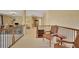 Bright hallway featuring railings and decorative seating near a book shelf at 105 New Castle Ln, Tyrone, GA 30290