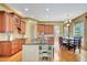 Well-equipped kitchen featuring a central island, cabinetry, and stainless steel appliances at 105 New Castle Ln, Tyrone, GA 30290