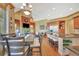 Spacious kitchen with hardwood floors, a large island, and stainless steel appliances at 105 New Castle Ln, Tyrone, GA 30290