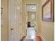 Hallway view into laundry room with washer and dryer at 105 New Castle Ln, Tyrone, GA 30290