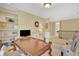 Inviting loft area with built-in bookshelves, a desk, and seating at 105 New Castle Ln, Tyrone, GA 30290