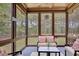 Screened porch with views of private backyard at 105 New Castle Ln, Tyrone, GA 30290
