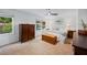 Bright bedroom with large bed, natural light, and wood accents giving a cozy atmosphere at 6800 Wright Rd, Atlanta, GA 30328
