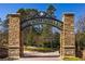 Abernathy Greenway entrance featuring stone columns and landscaped surroundings at 6800 Wright Rd, Atlanta, GA 30328