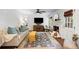 Inviting living room with fireplace, hardwood floors, and comfortable seating, ideal for relaxing and entertaining at 6800 Wright Rd, Atlanta, GA 30328