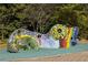 A colorfully decorated mosaic sculpture adds charm to this neighborhood playground at 6800 Wright Rd, Atlanta, GA 30328